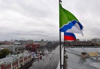 A bandeira e o brasão de armas de Novosibirsk