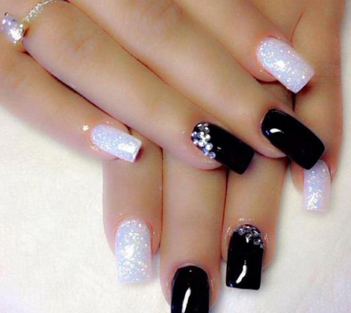 black manicure with pebbles