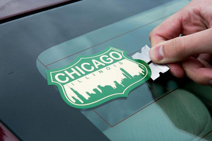 how to remove stickers from the windshield