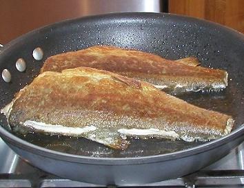 trout fried in a pan
