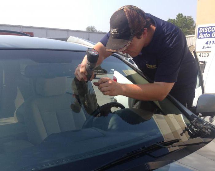 adhesive remover cracks on the windshield