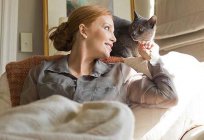 How cats treat people and what ailments?