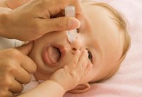 Schätzchen wird ständig belasten und Grunzen. Warum das Neugeborene Grunzen und belasten im Schlaf, während der Fütterung?