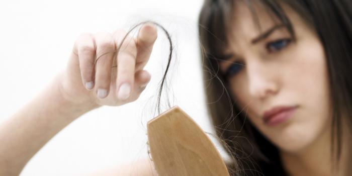 how to stop hair loss in women