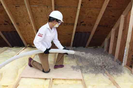 attic Insulation inside of your hands