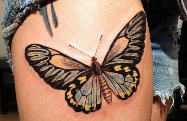 butterfly tattoo on leg for girls