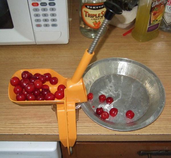 machine for removing pits from cherries