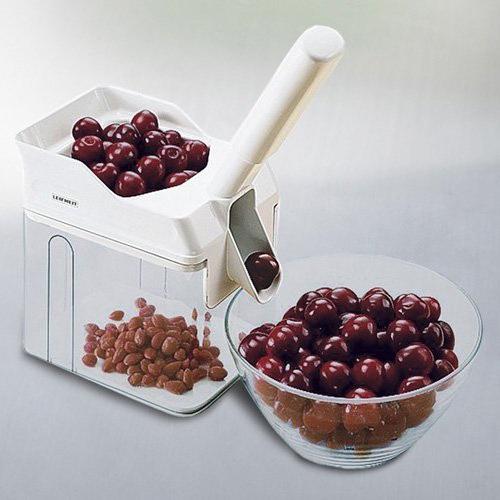 device for removing pits from cherries