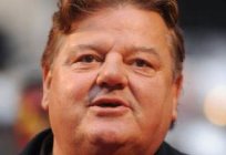 Robbie Coltrane. Height and weight instead of business cards