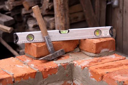 the thickness of a brick bearing wall