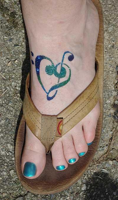 tatuajes de clave de sol de la foto