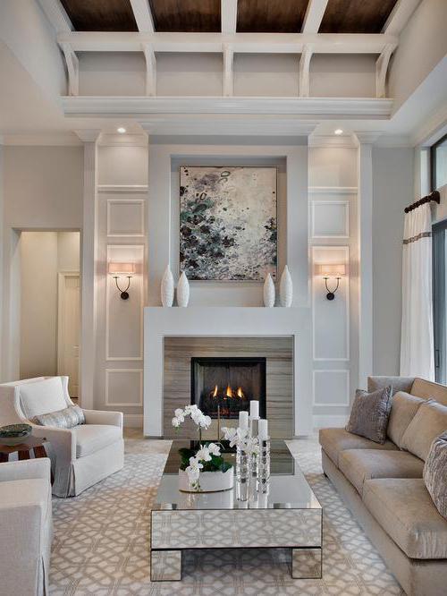 el interior de la sala de estar de estilo moderno con chimenea