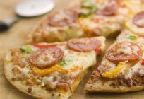 Special recipe of pizza with cheese and sausage