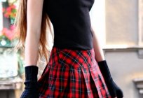 सबसे सफल स्कर्ट की शैली में एक पिंजरे