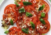 El tomate Rosa de spam: características de la variedad, de la foto, los clientes
