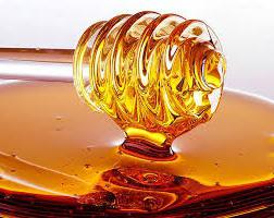 what is the weight of a liter of honey