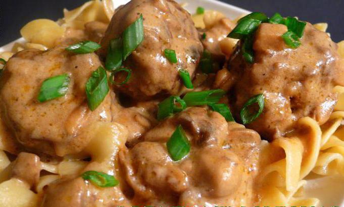 fish meatballs in sour cream sauce in the oven
